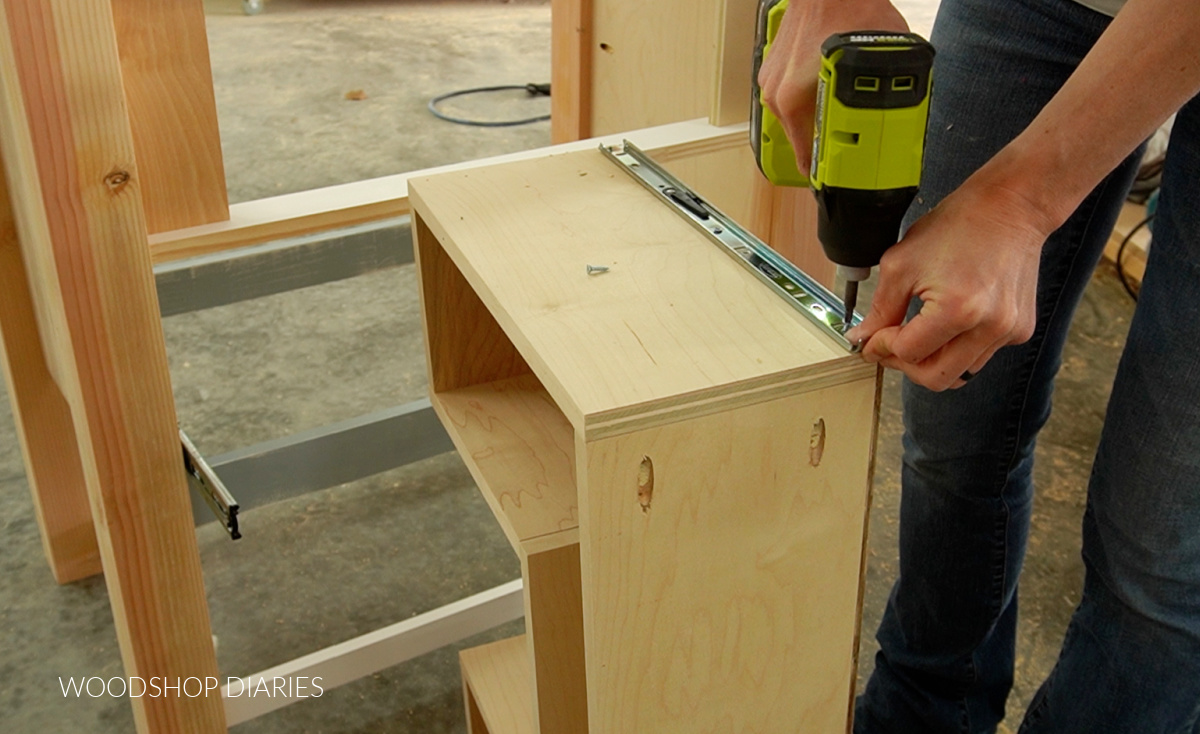 Installing drawer slides onto sides of drawer box