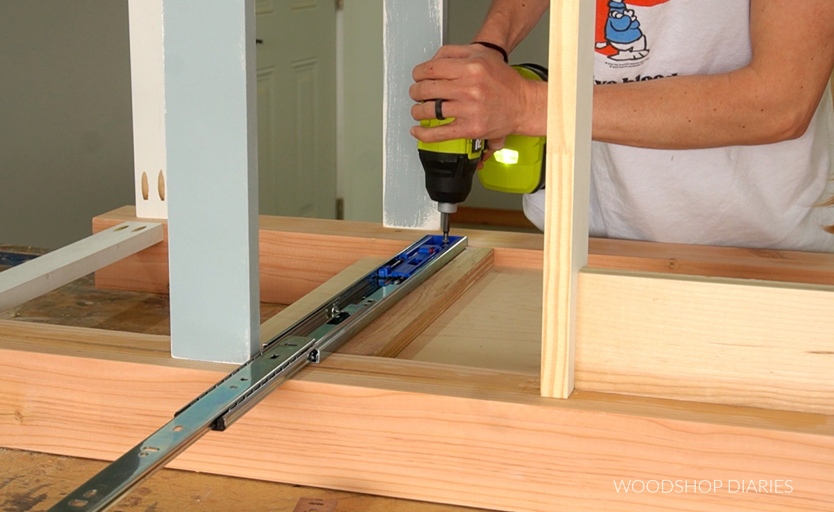 Installing drawer slides into sides of bathroom vanity