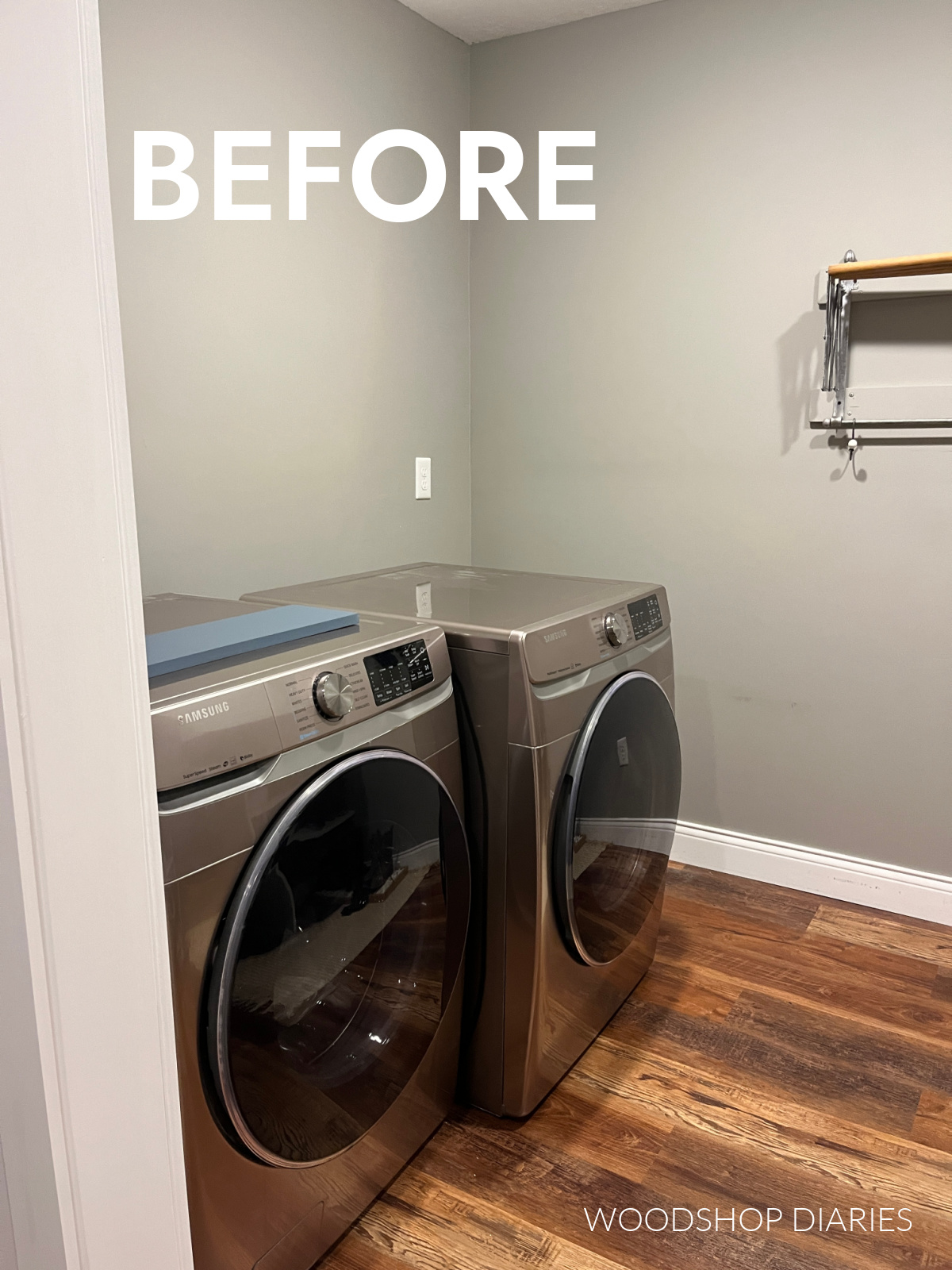 Laundry room before--left side above washer and dryer empty