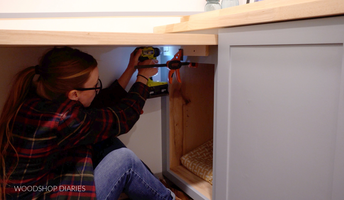 Shara Woodshop Diaries securing countertop support on top of base cabinet