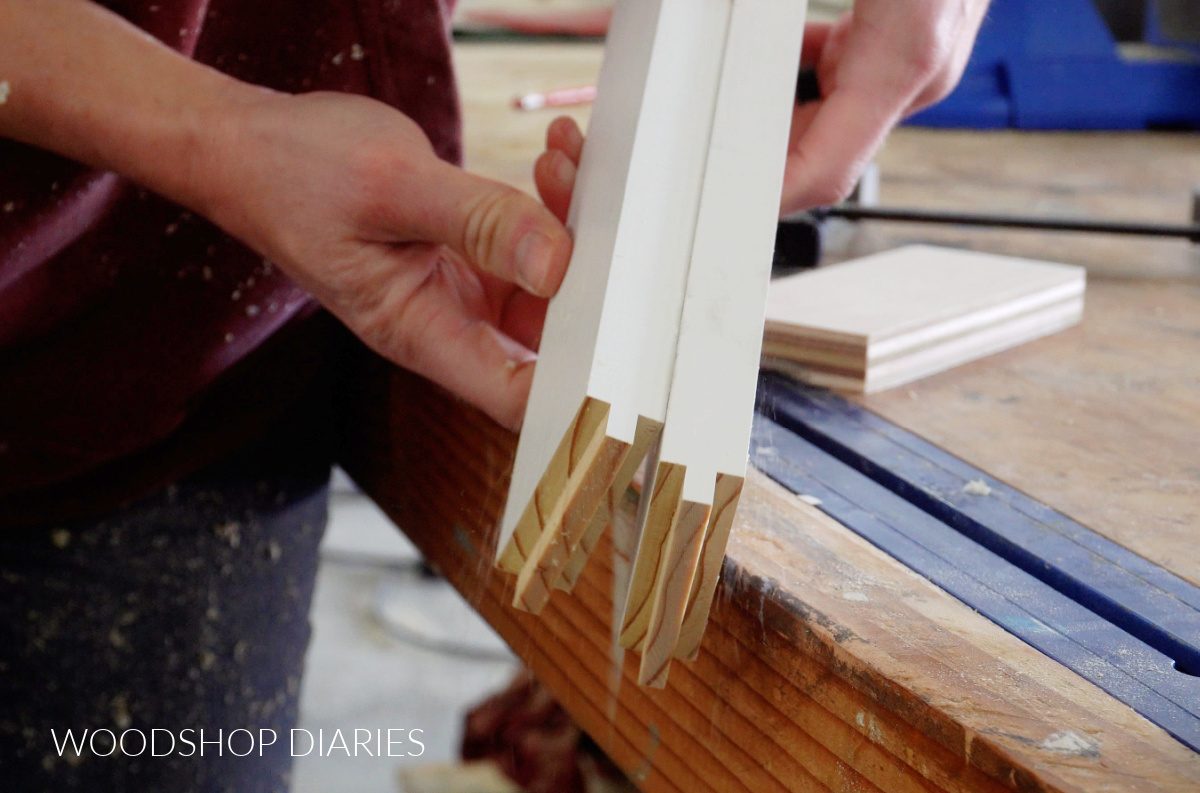 close up of cabinet door rails with tongues cut in ends
