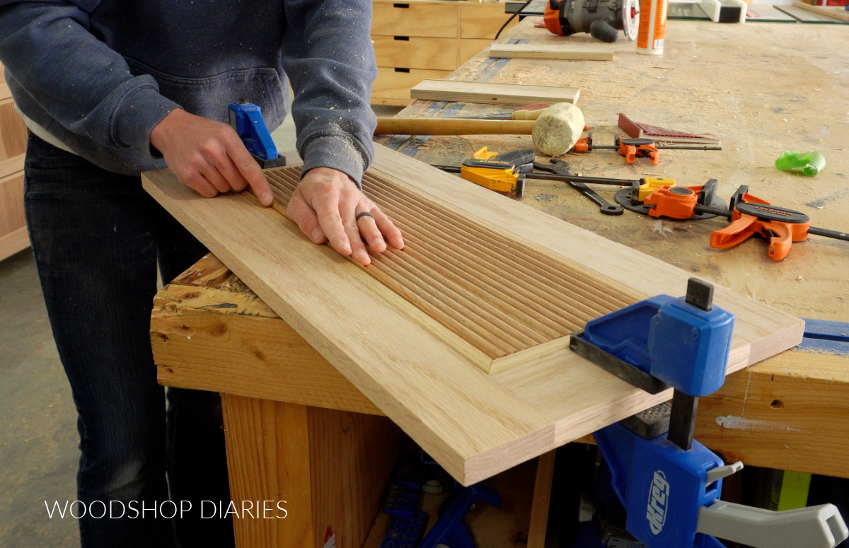 Installing fluted trim detail to front of vanity cabinet doors