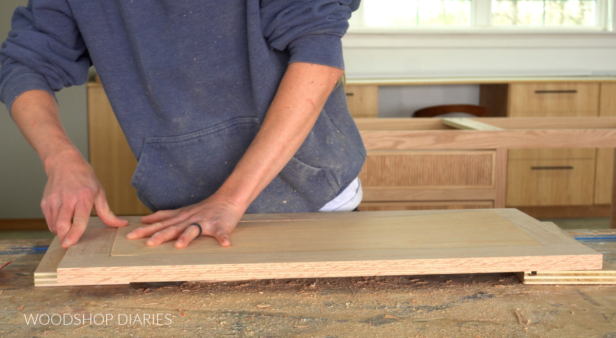 Shara Woodshop Diaries building vanity doors--installing ¼" plywood center panel on back side of door frame