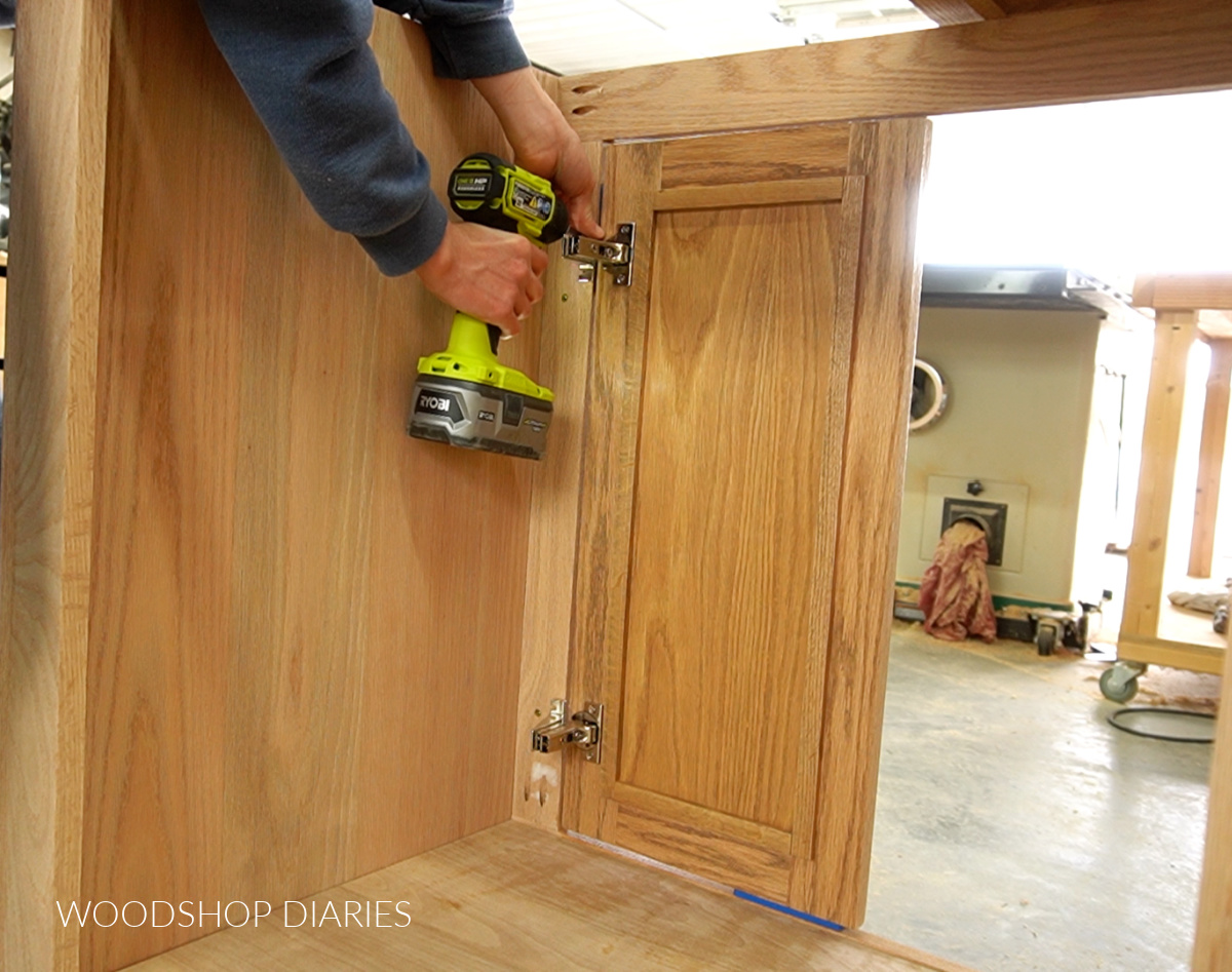 Shara Woodshop Diaries installing inset cabinet doors from inside of vanity using a drill