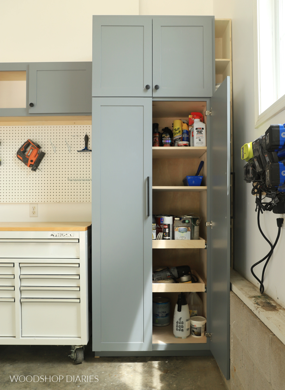 DIY garage makeover pantry cabinet with door open showing items stored inside