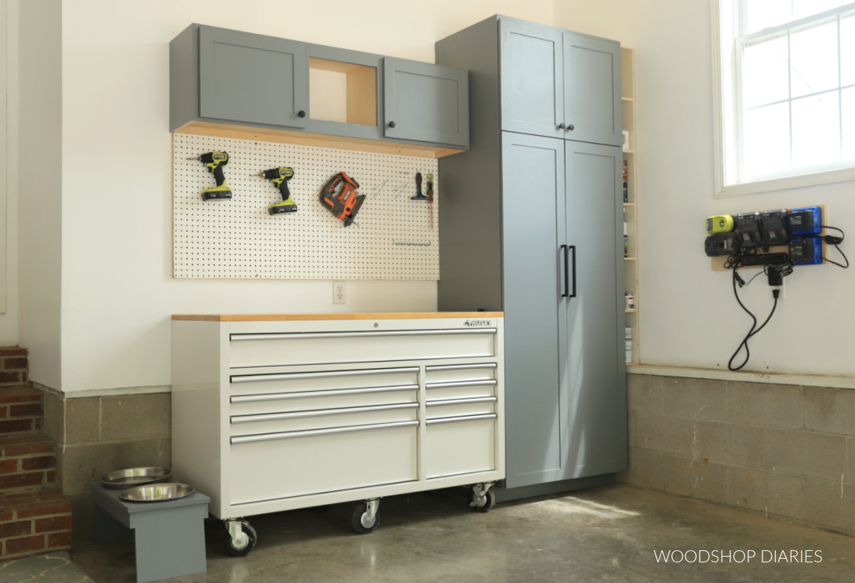 Completed garage makeover with pantry cabinet, peg board, and tool chest 