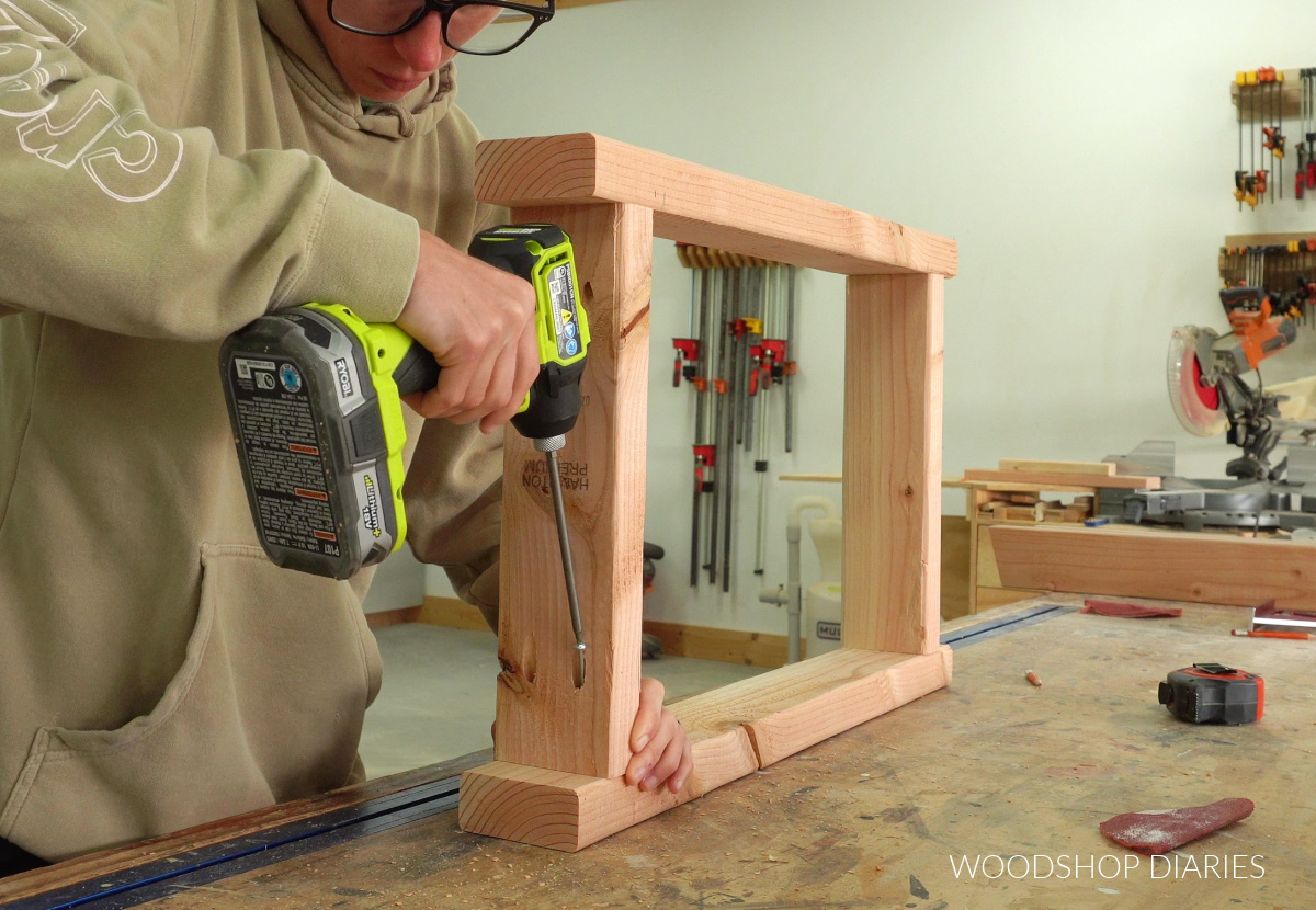 Shara Woodshop Diaries assembling the frame for the bottom of range hood cover