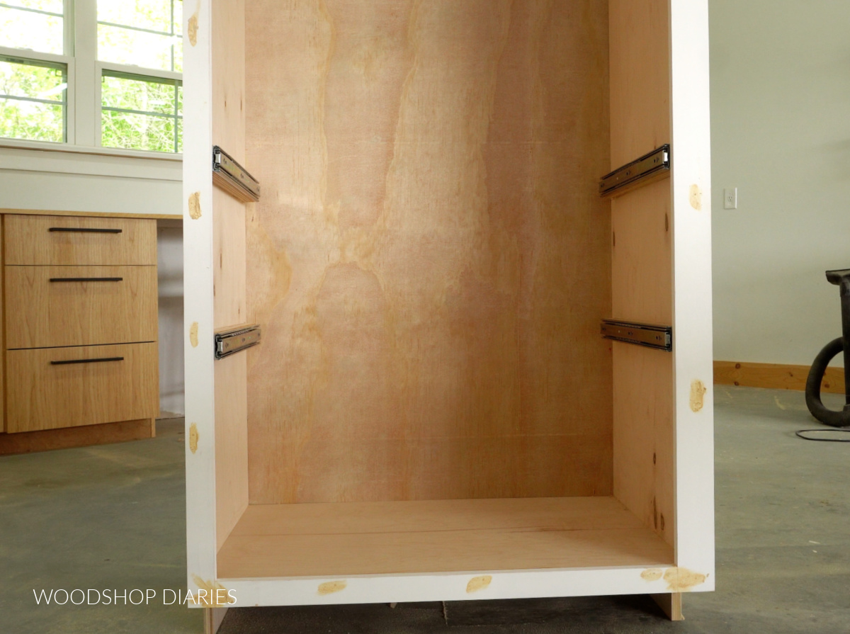 Drawer slides installed into cabinet for pull out drawer shelves