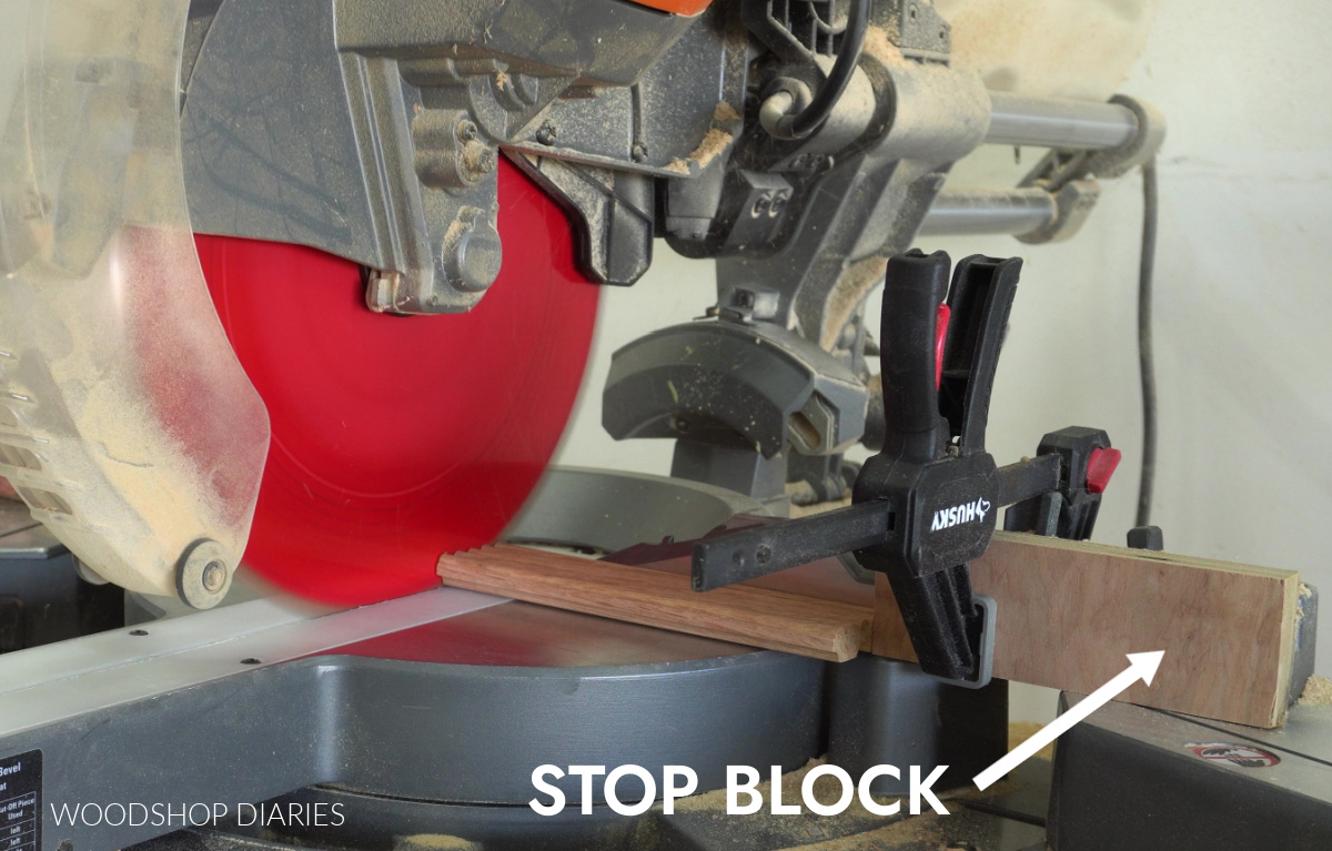 stop block clamped to miter saw for cutting fluted trim for drawer front