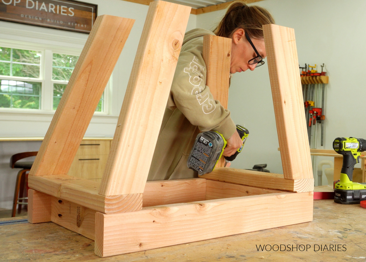 Shara Woodshop Diaries assembling range hood cover frame in workshop