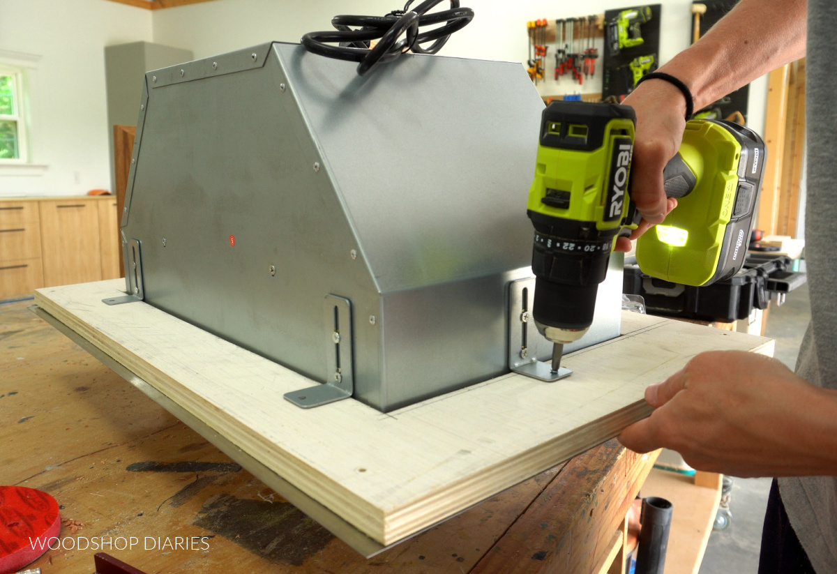 Installing fan insert to plywood panel