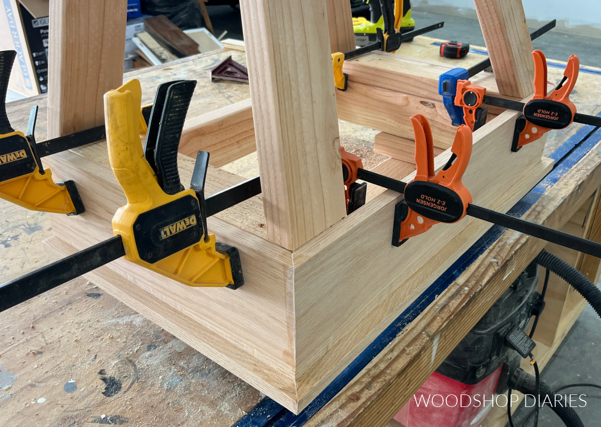 trim cut to fit around bottom of range hood cover frame to trim it out