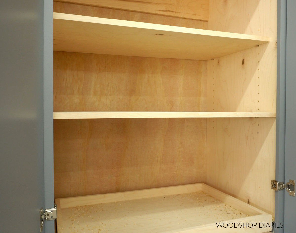 Adjustable plywood shelves installed into pantry cabinet using shelf pins