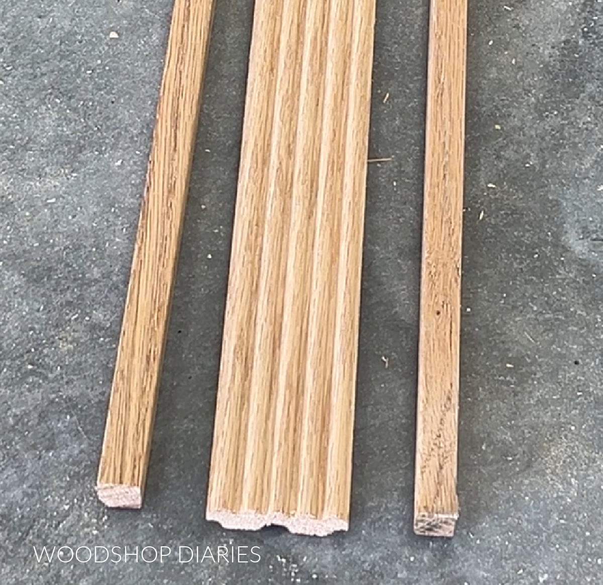 Fluted oak casing trim cut into three pieces--two square ends and a fluted center