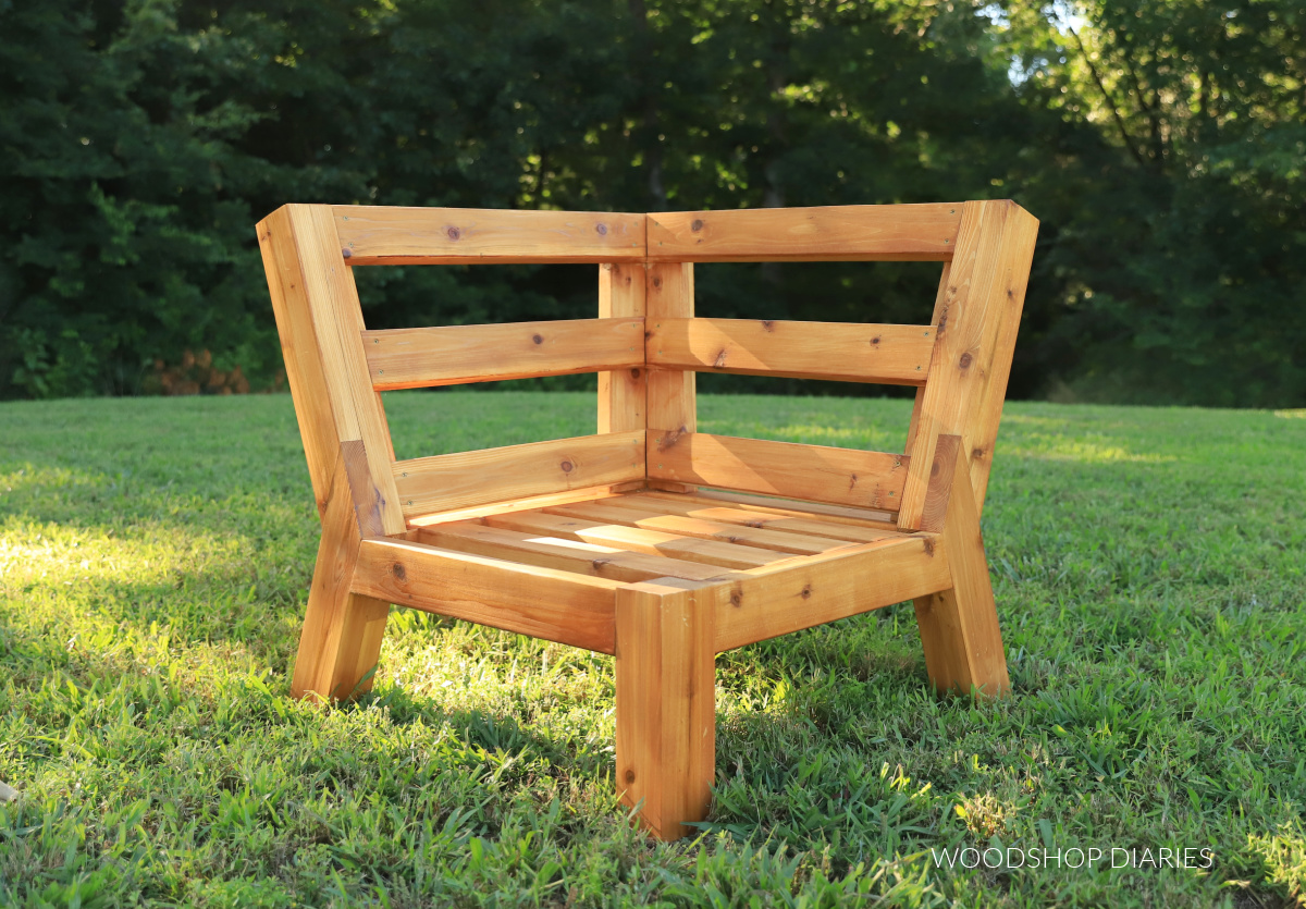 Corner sectional chair without cushions sitting in yard