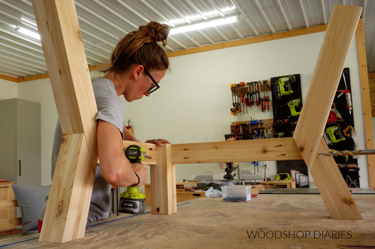 Shara Woodshop Diaries assembling front corner of seat frame on workbench