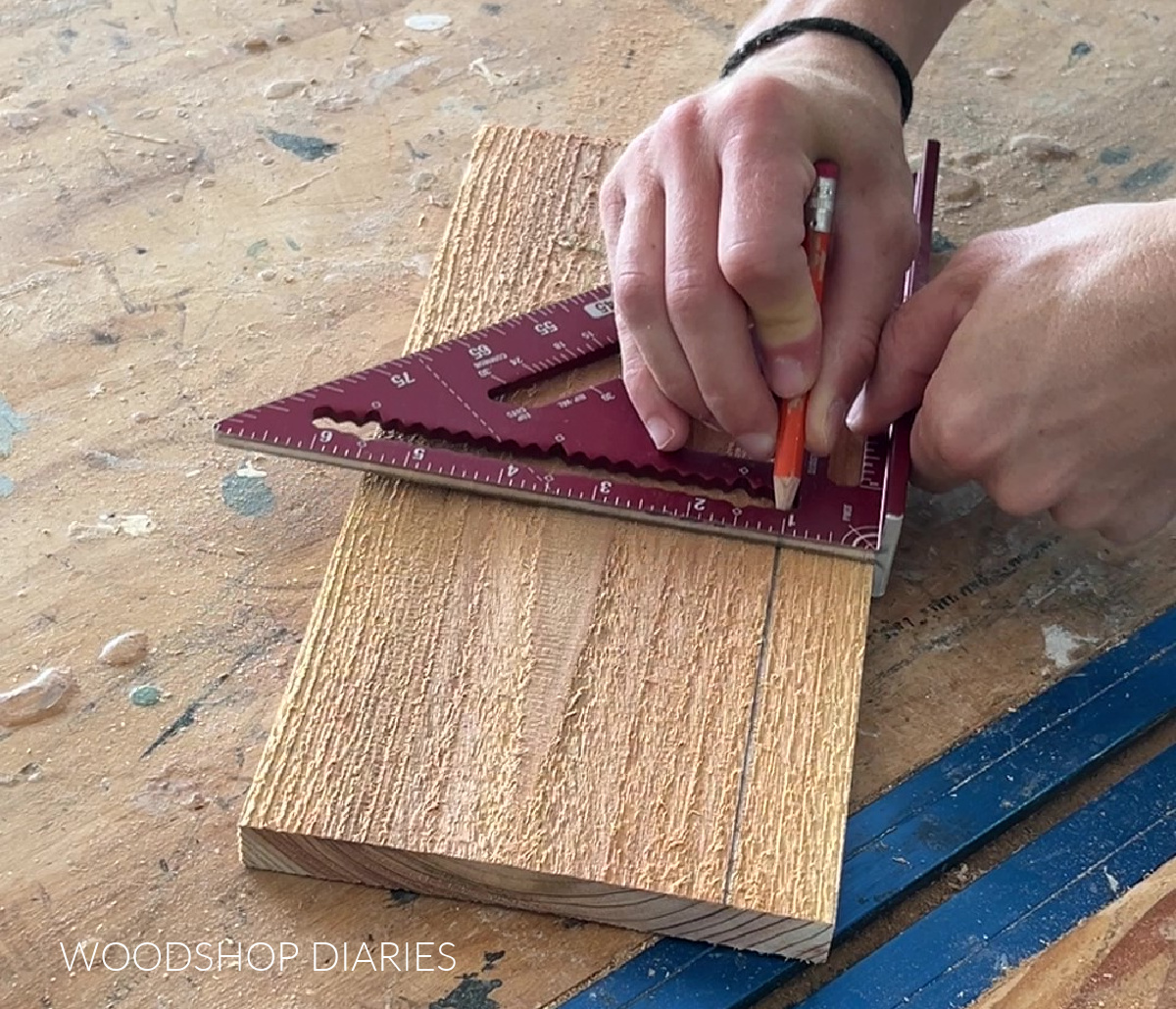 Marking 1" offset line on board using a speed square