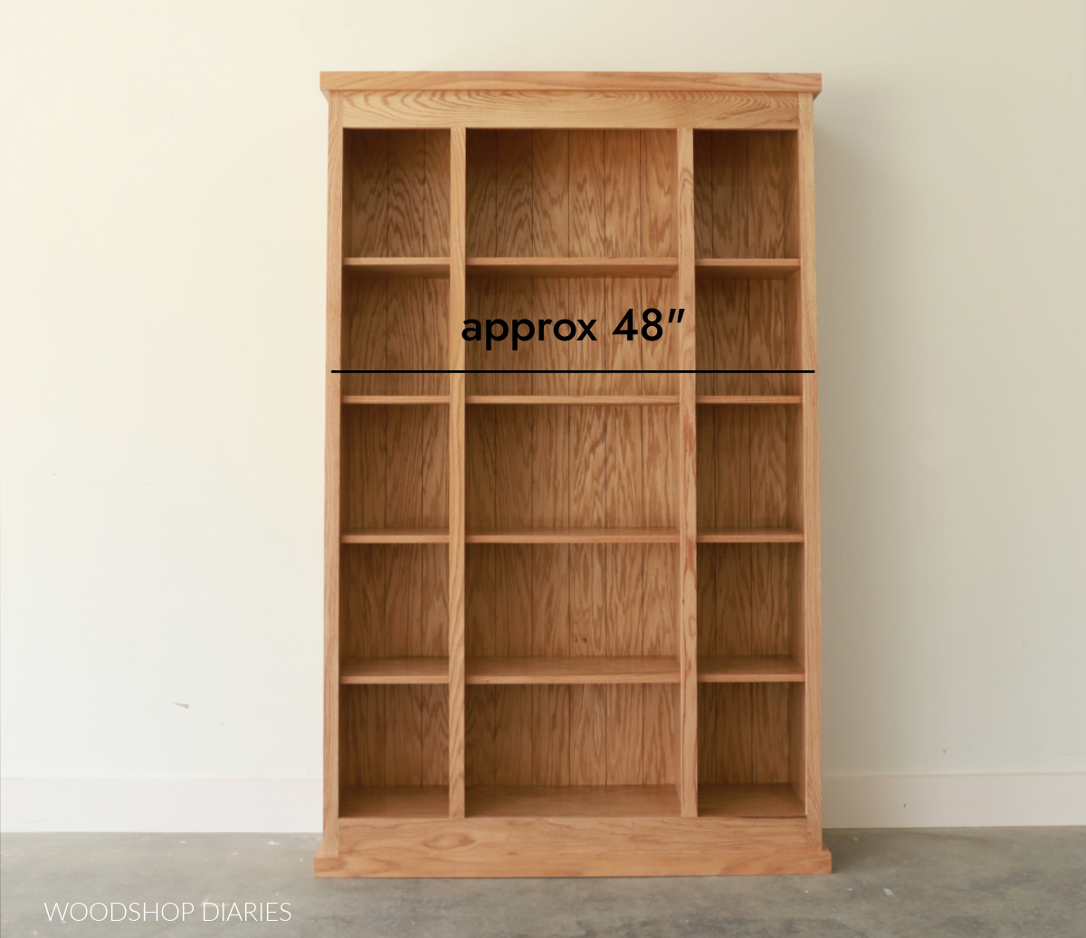 Empty bookcase with text "approx 48" above a line drawn across shelf