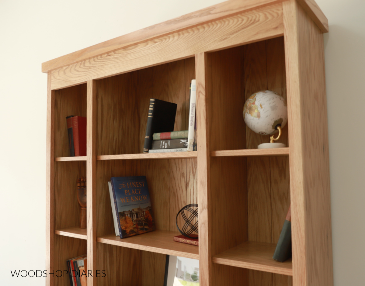 Close up of bookcase with stationary shelves