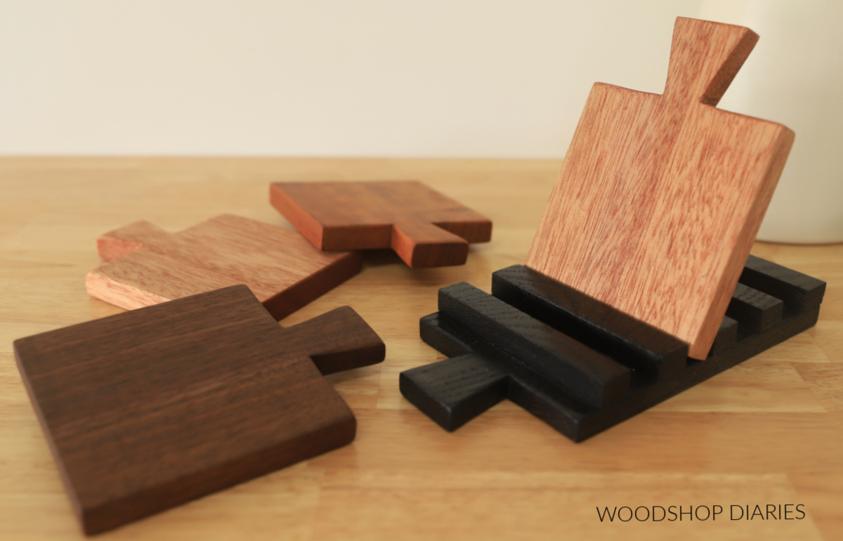 different wood types cut into miniature cutting board shaped for scrap wood drink coaster project