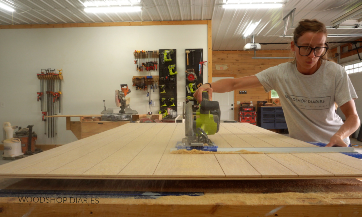 Shara Woodshop Diaries cutting shiplap pattern in plywood back panel for DIY bookcase