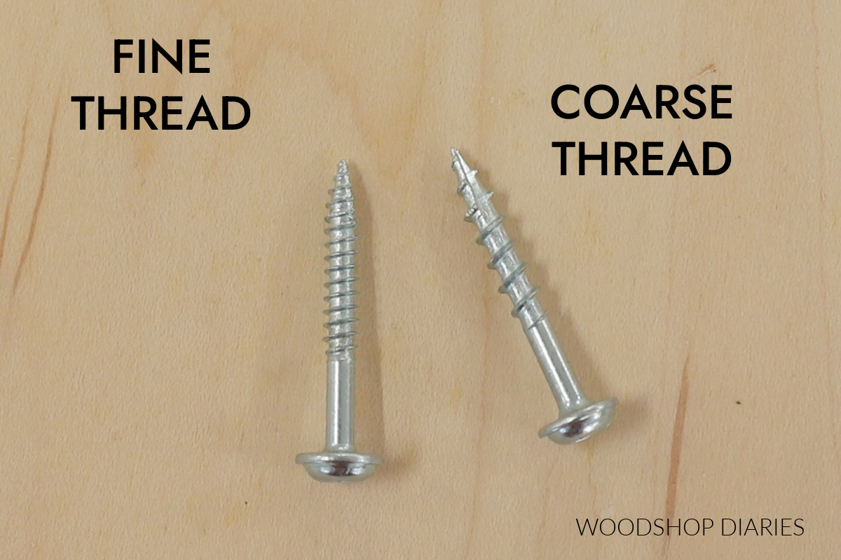 a fine thread pocket hole screw next to a coarse thread pocket hole screw on a piece of wood