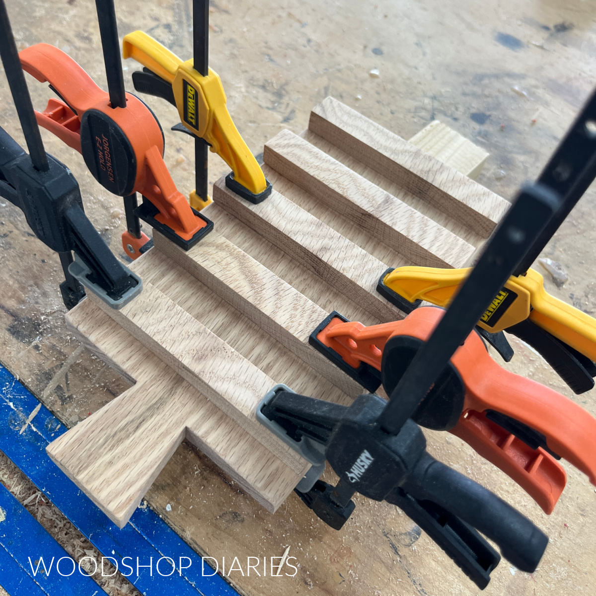 divider strips glued onto drink coaster tray with clamps