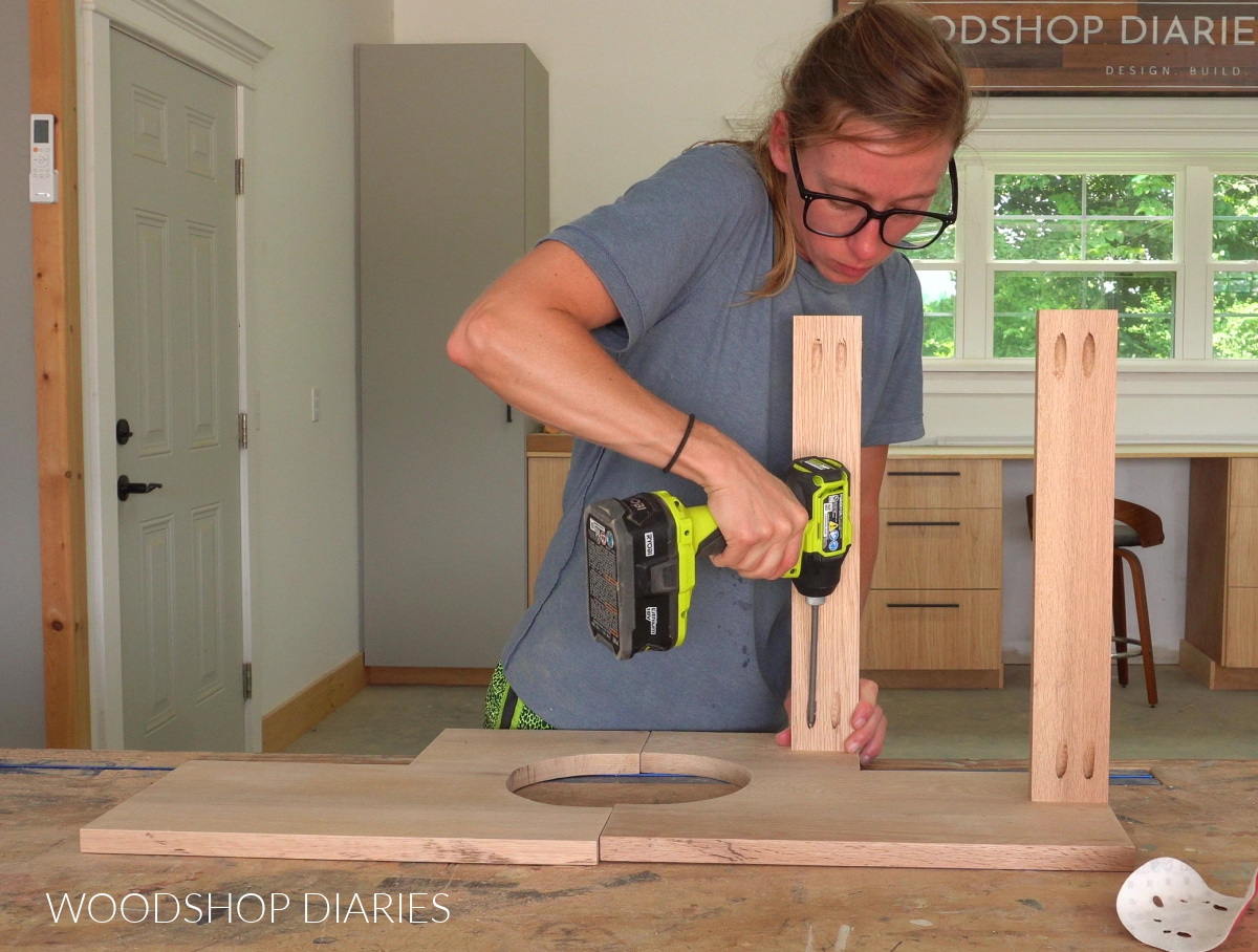 Shara Woodshop Diaries installing DIY side table supports between sides with pocket hole screws