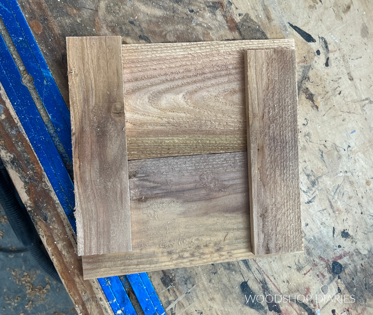 fence picket pieces cut for front of wheelbarrow