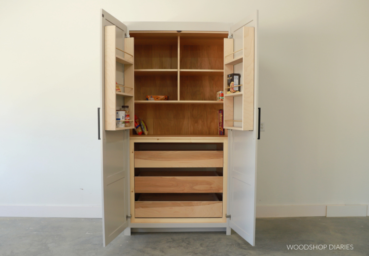 Finished DIY Kitchen Larder Cabinet with doors open--drawers in bottom and shelves at top and on back side of doors