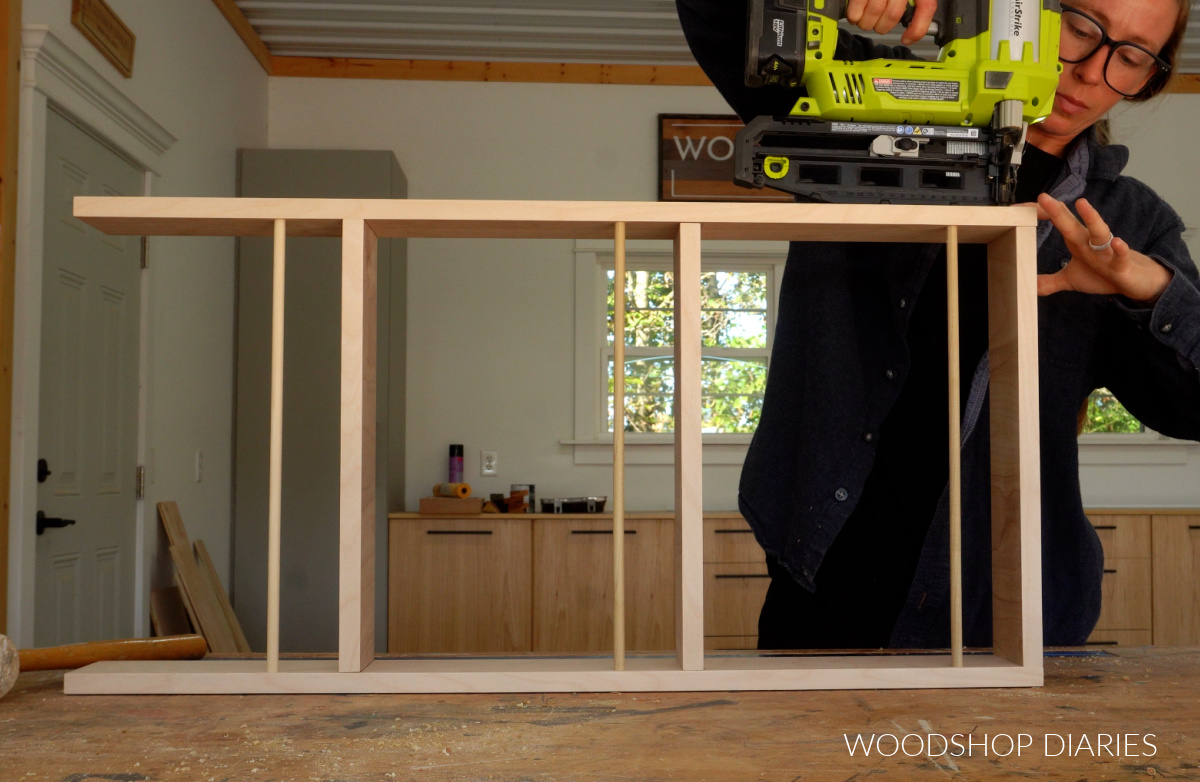 Shara Woodshop Diaries nailing together door shelf for back side of door