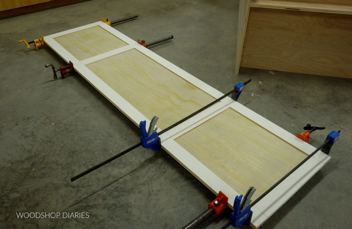 Large cabinet door gluing up in clamps