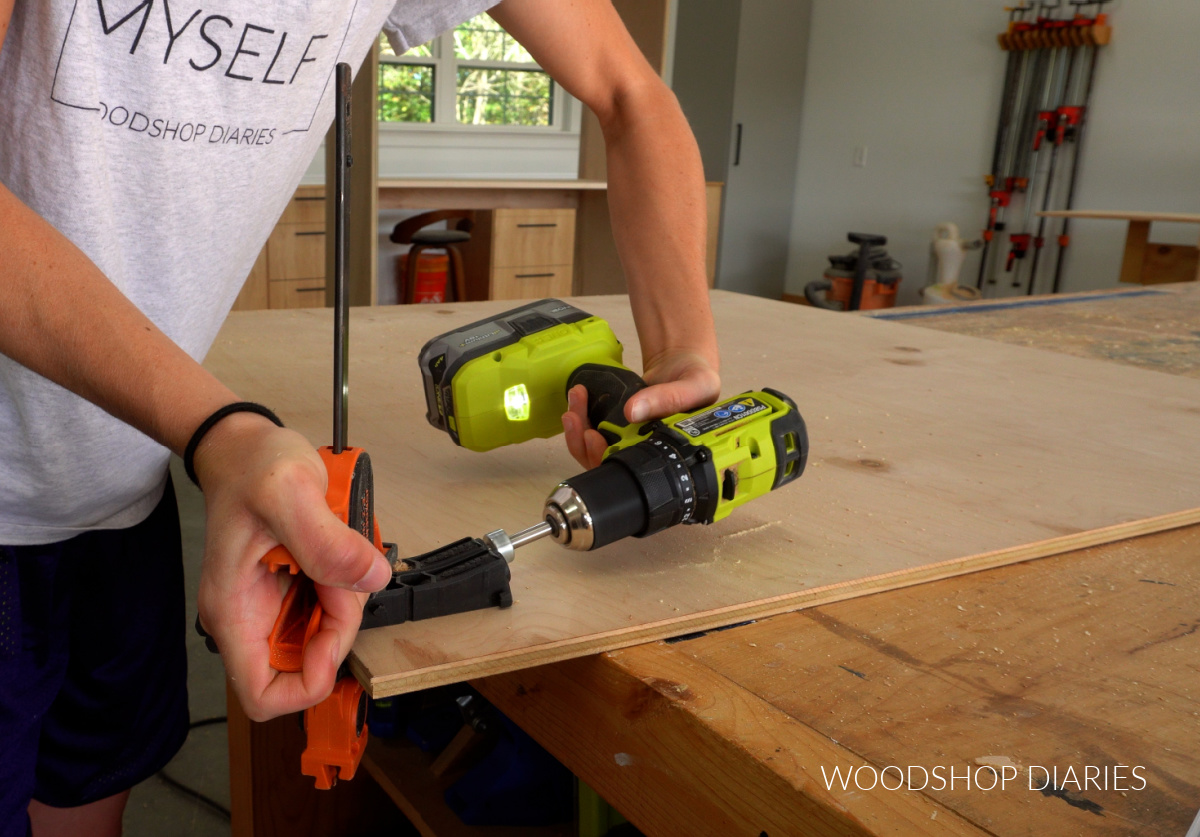 Close up of drilling pocket holes into ½" plywood with Kreg Micro Jig