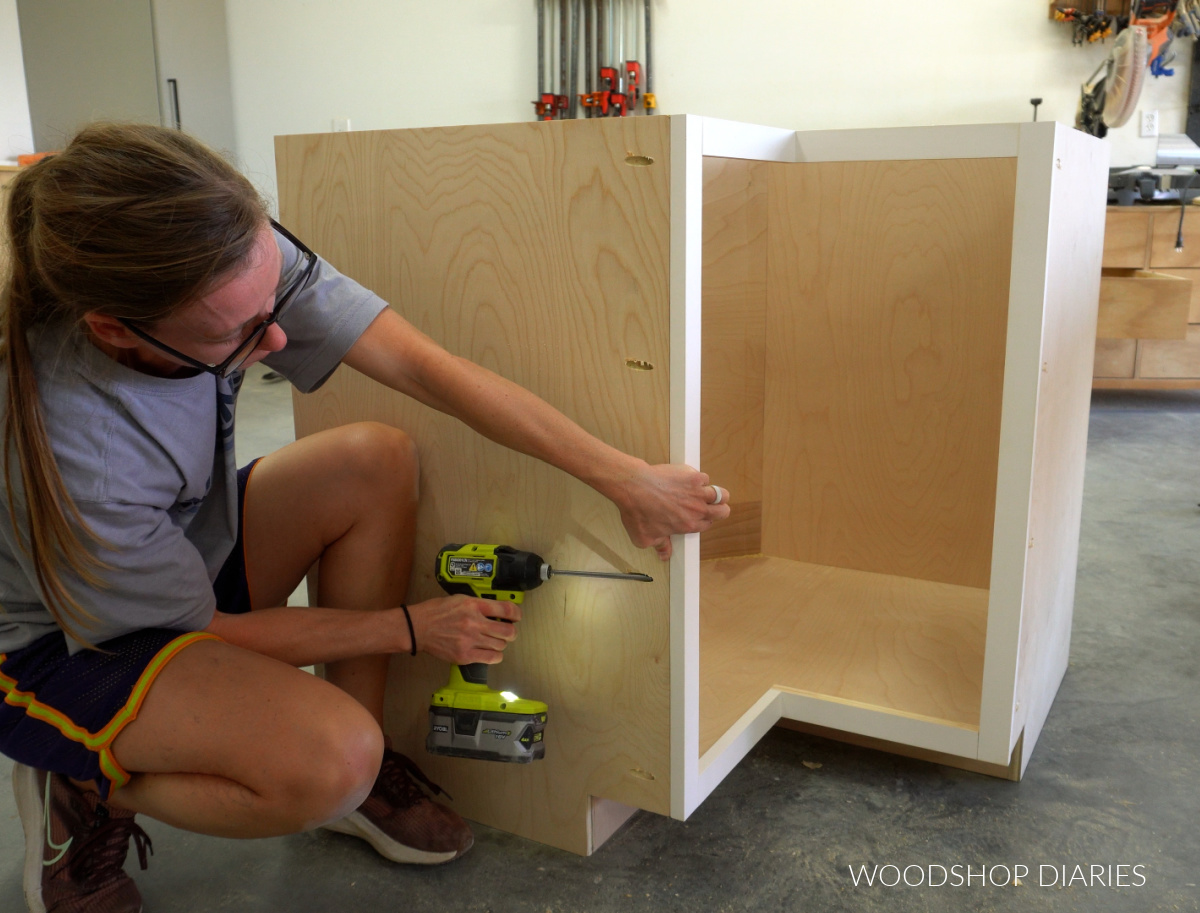 Shara Woodshop Diaries attaching face frame onto cabinet with pocket hole screws in the side panel