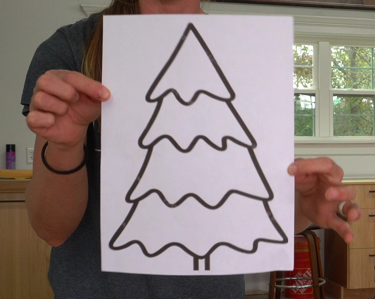black and white template of a christmas tree shape printed on paper