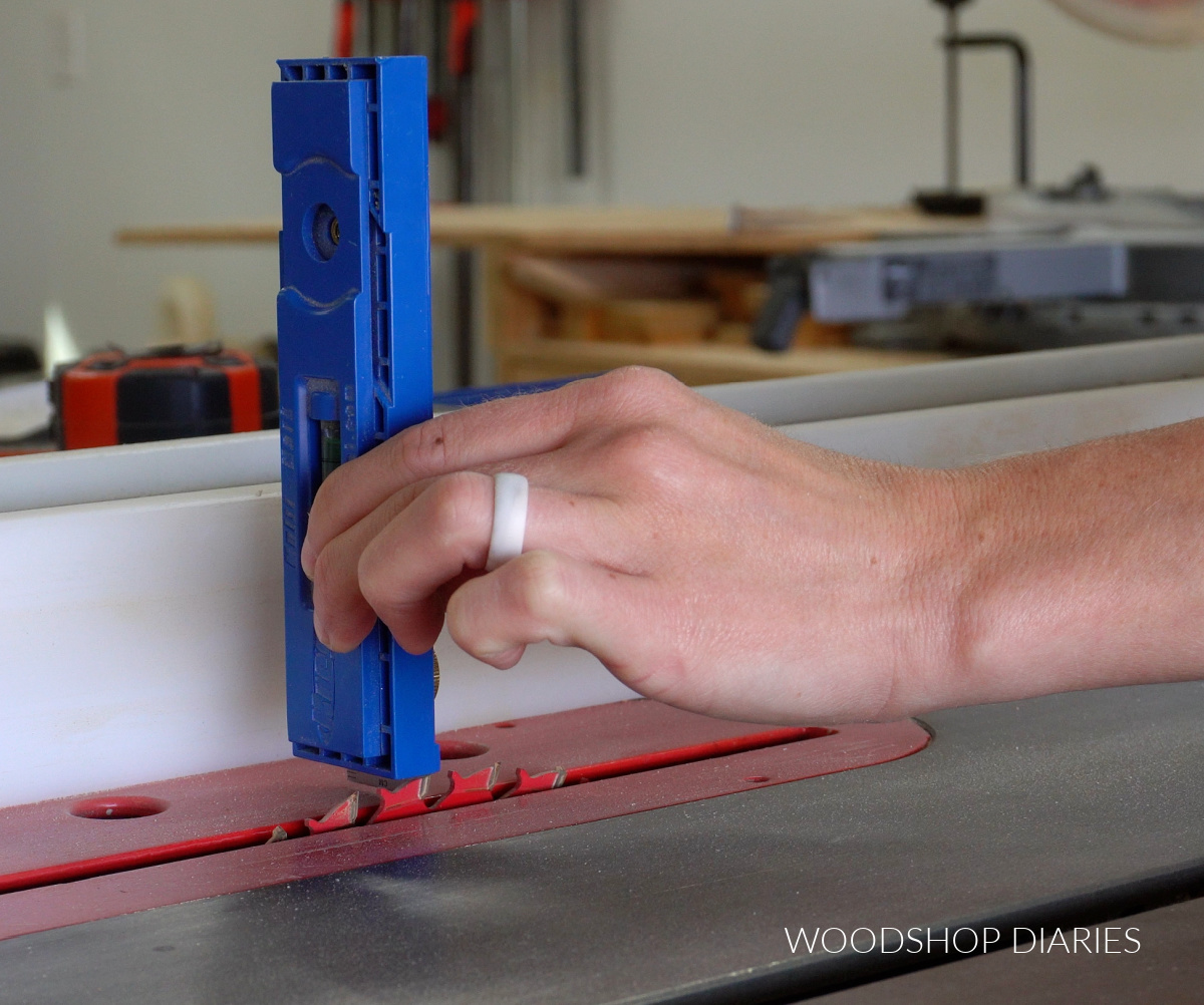 adjusting table saw blade height with Kreg Multimark tool