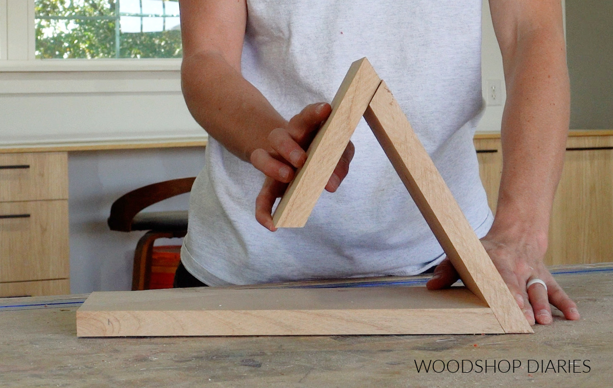 Shara Woodshop Diaries dry fitting the book holder pieces together on workbench