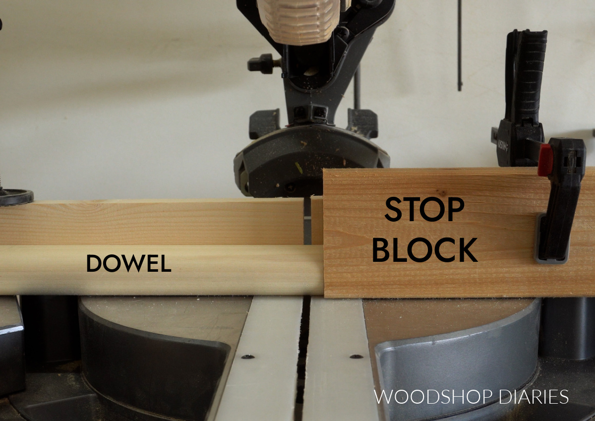 Stop block set up on miter saw to cut wood dowel for game pieces