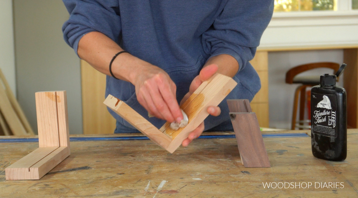 Shara Woodshop Diaries applying furniture finish to DIY photo frames