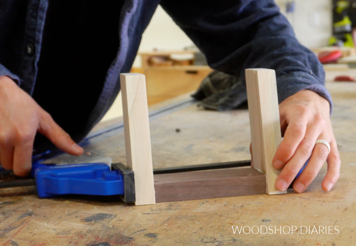 Shara Woodshop Diaries clamping sides of DIY photo frame together