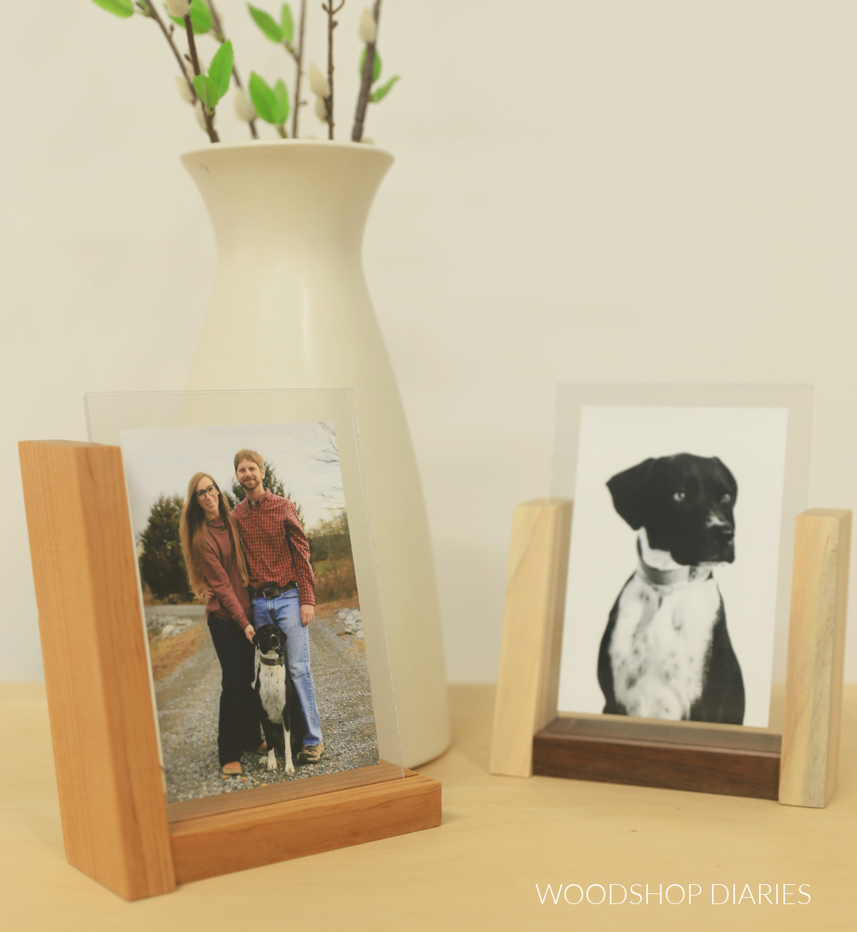 Floating photos in DIY wooden photo frames on desktop