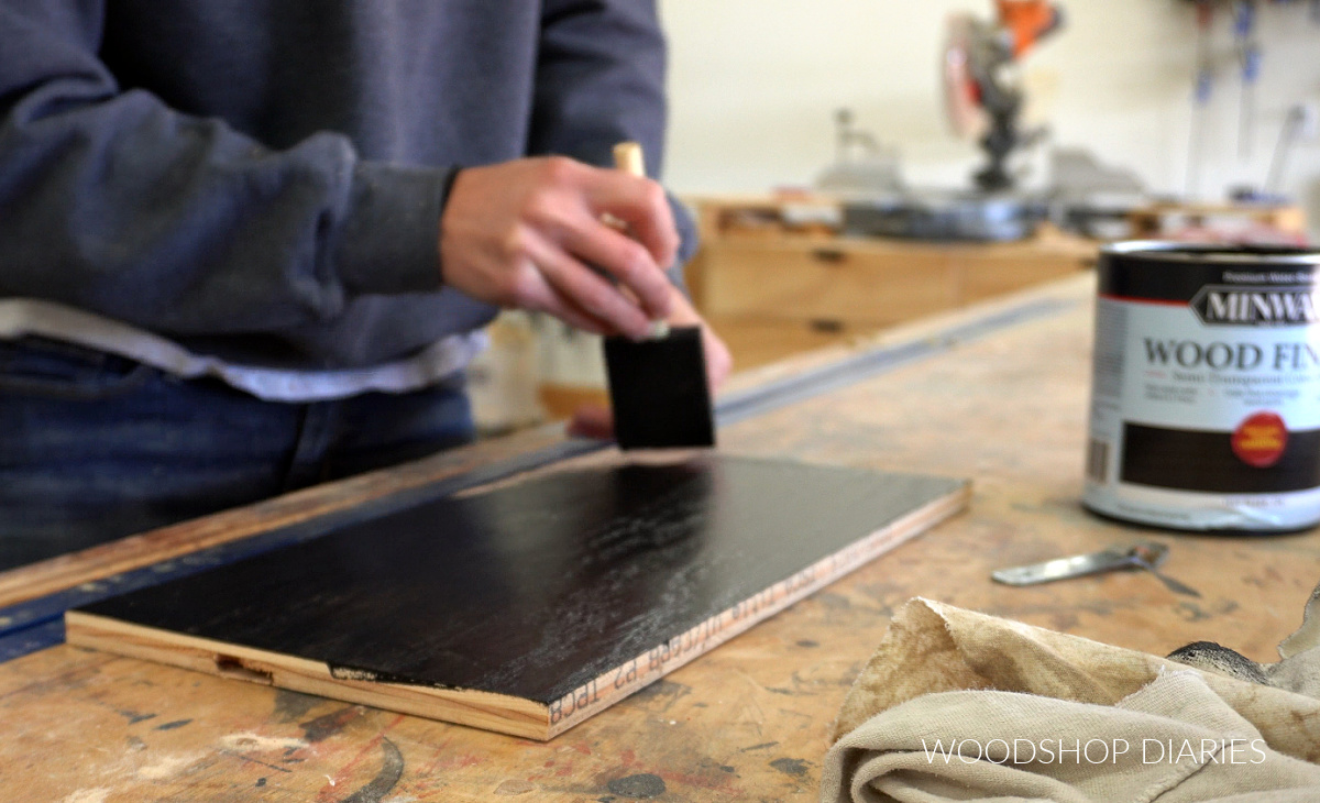 Shara Woodshop Diaries staining red oak plywood panel black on workbench