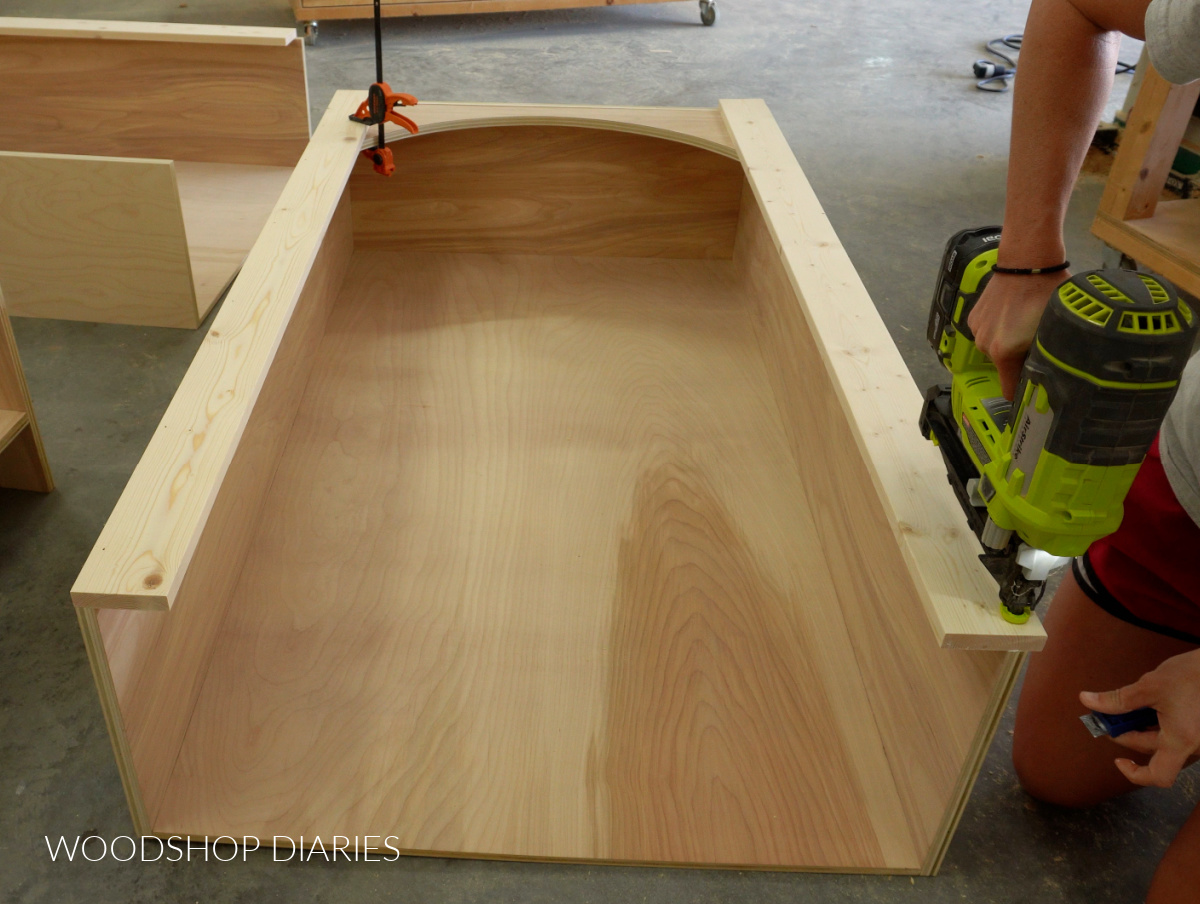 Shara Woodshop Diaries nailing face frame onto front of bookcases for built ins