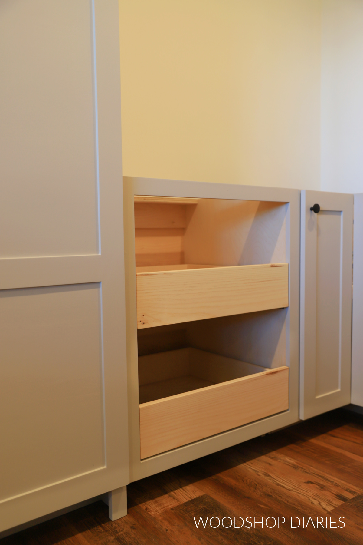 Walk in Pantry with pull out shelf cabinet between tall pantry cabinet and corner base cabinet