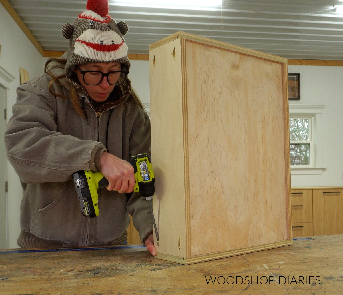 Shara Woodshop Diaries assembling drawer box on workbench with pocket holes