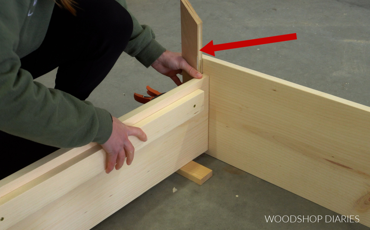 Shara Woodshop Diaries dry fitting bed side rails and headboard together at corner with scrap block for proper spacing
