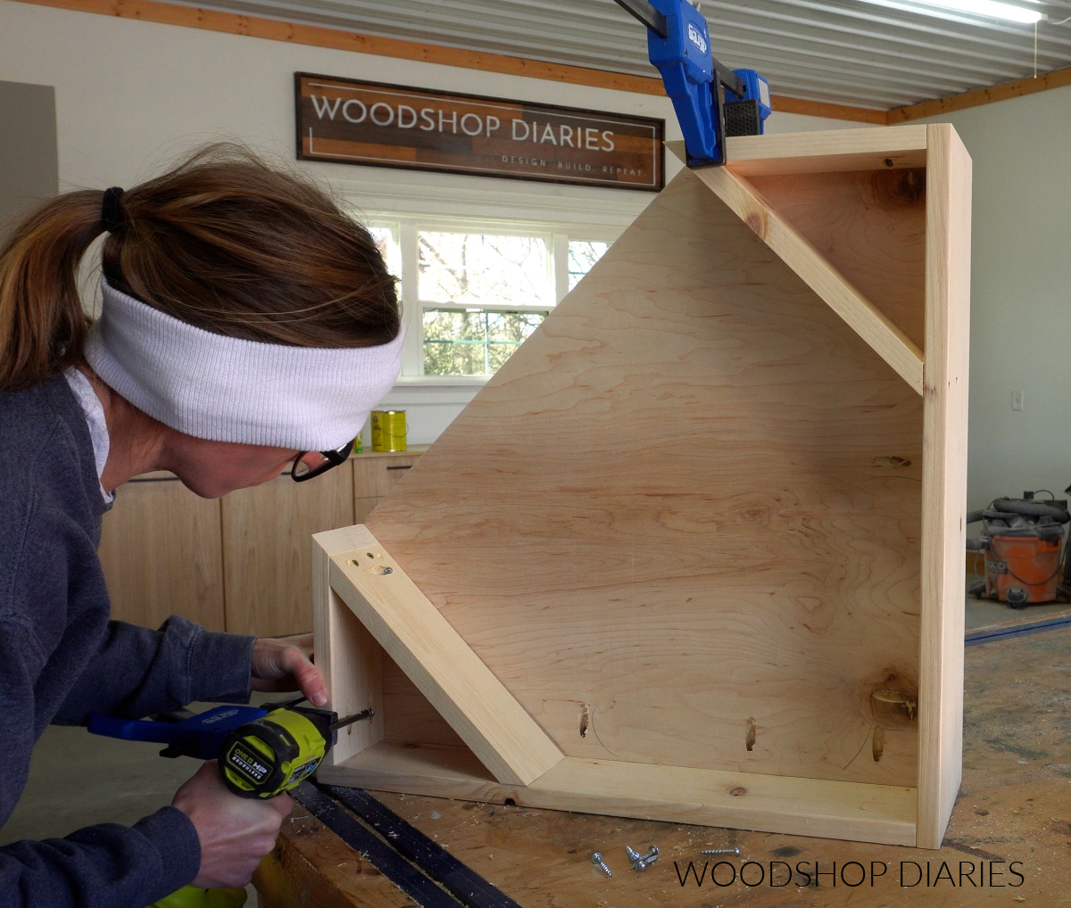 Shara Woodshop Diaries securing corner desk top to desk frame