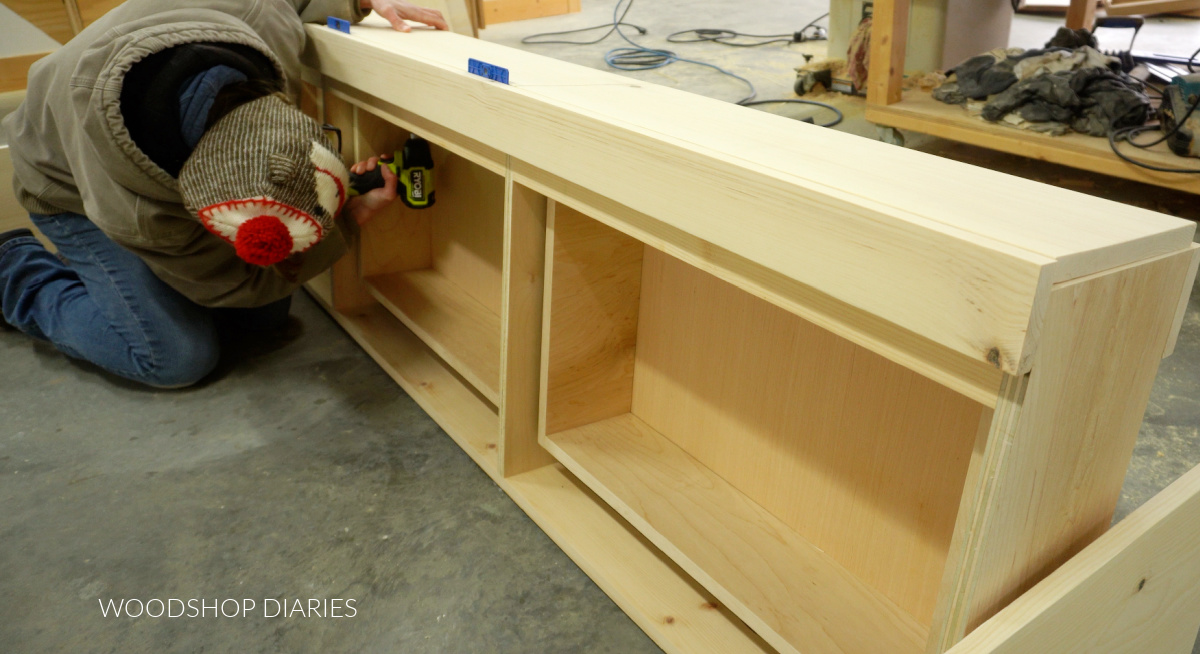 Shara Woodshop Diaries securing continuous grain drawer fronts to storage bed side rails