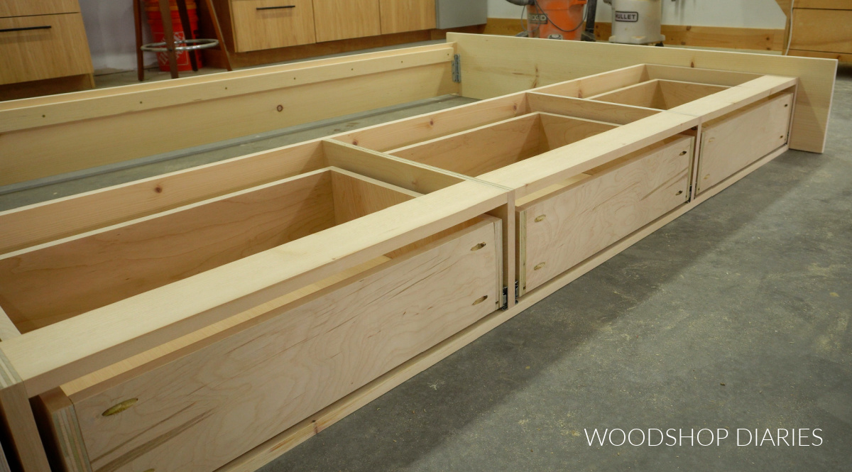 Storage bed side rail with drawers installed--three large drawers 