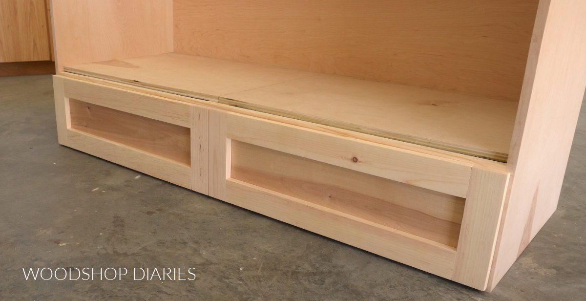 Drawer front frame installed onto drawer box in bottom of murphy bed cabinet